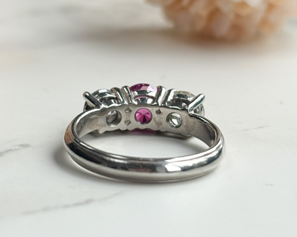 1940s untreated and natural pink sapphire and diamond three stone ring in platinum, for sale in Leeds, Yorkshire, showing reverse of the ring