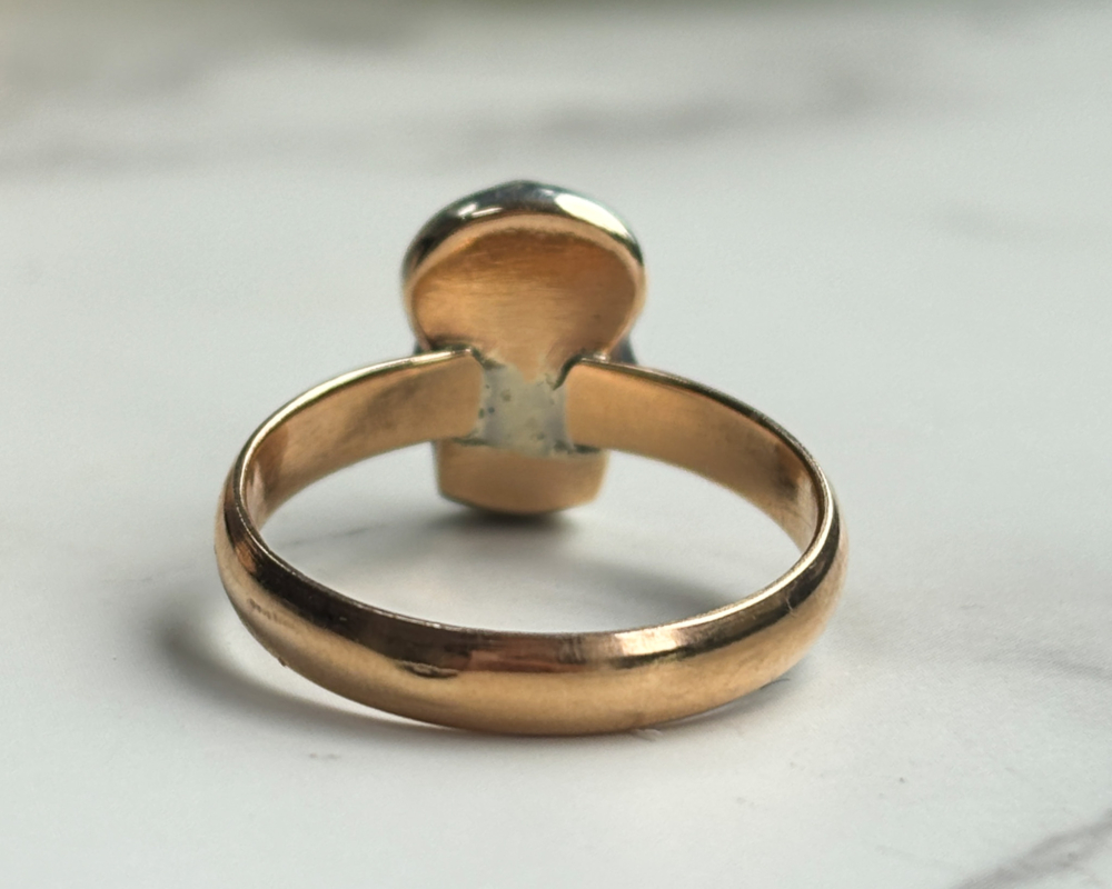 antique Victorian 9ct gold skull ring with diamond and sapphire for sale in Leeds, showing back of ring