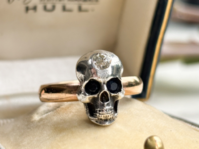 antique Victorian 9ct gold skull ring with diamond and sapphire for sale in Leeds