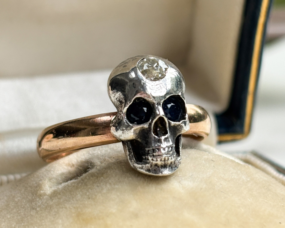 antique Victorian 9ct gold skull ring with diamond and sapphire for sale in Leeds