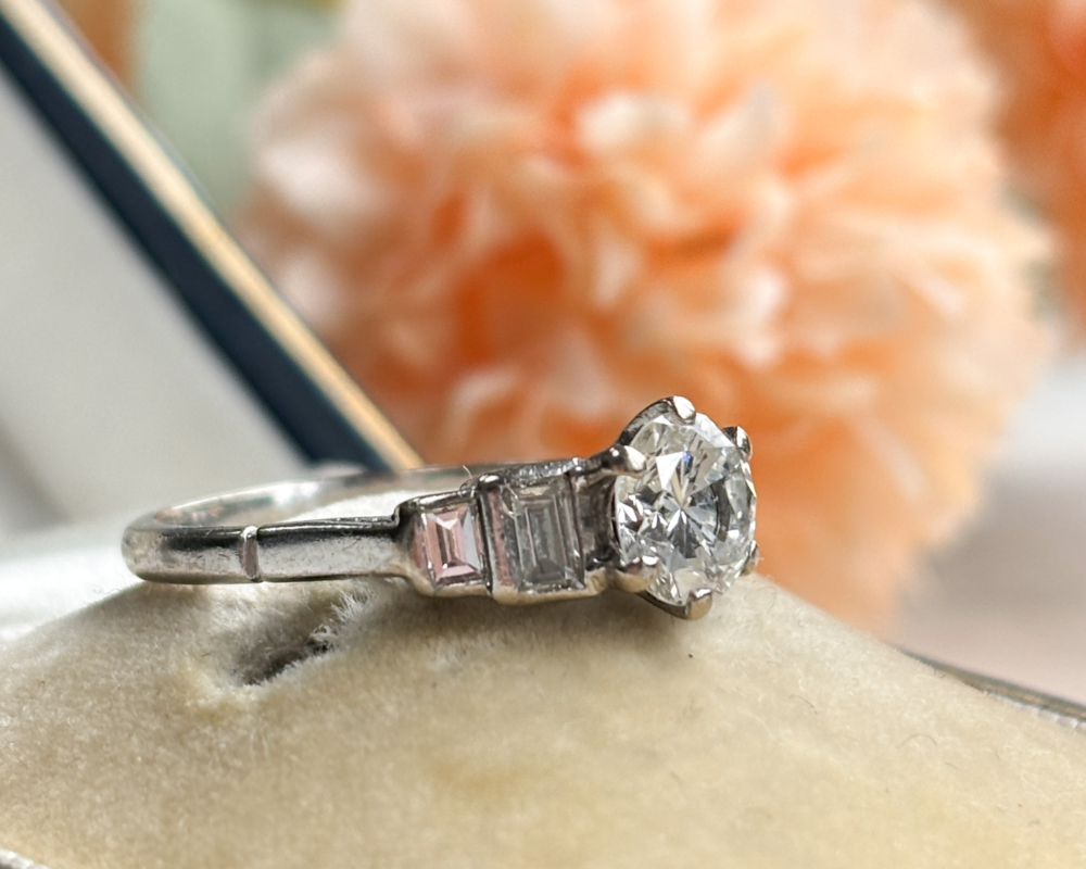 antique Art Deco diamond solitaire ring with baguette diamond shoulders 1.5ct total. For sale in Leeds, UK, showing side of the ring
