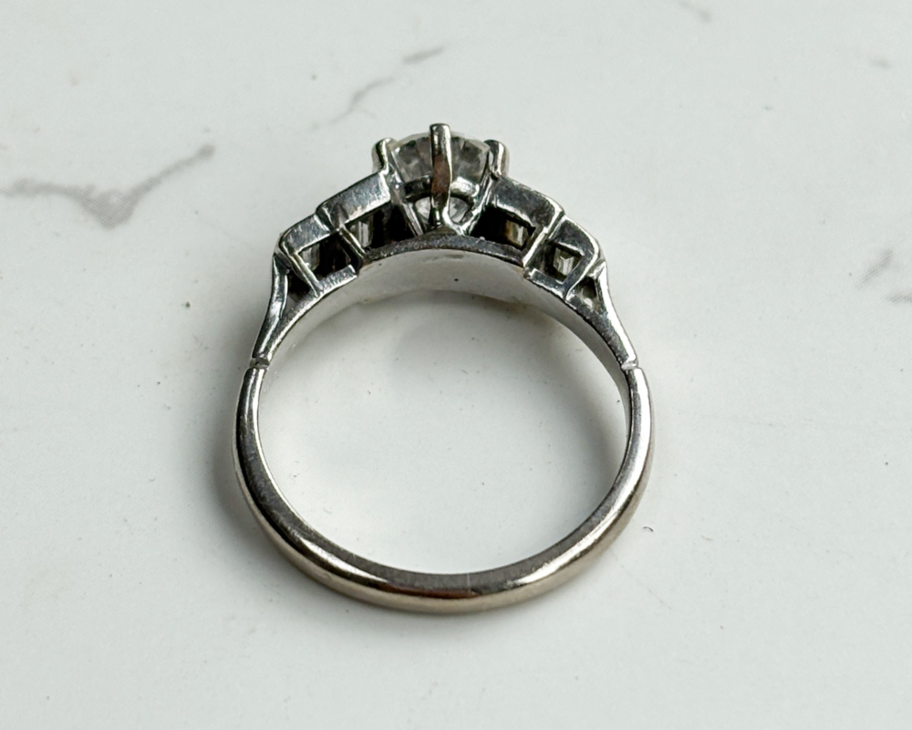 antique Art Deco diamond solitaire ring with baguette diamond shoulders 1.5ct total. For sale in Leeds, UK, showing underside of ring