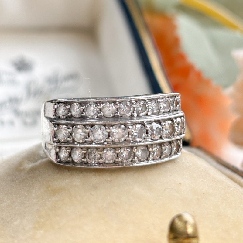 vintage triple row diamond half eternity ring in 18ct white gold, shown on a box
