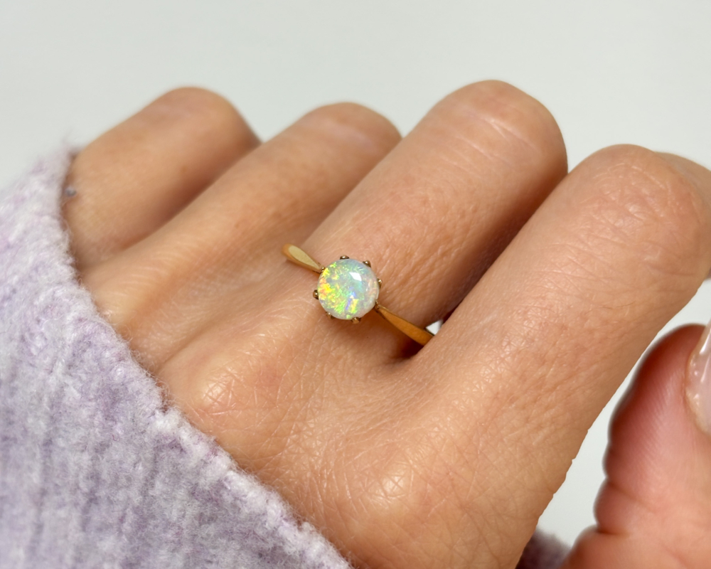 antique 1920s opal ring in 18ct gold for sale in Leeds, UK. Shown on a woman's finger