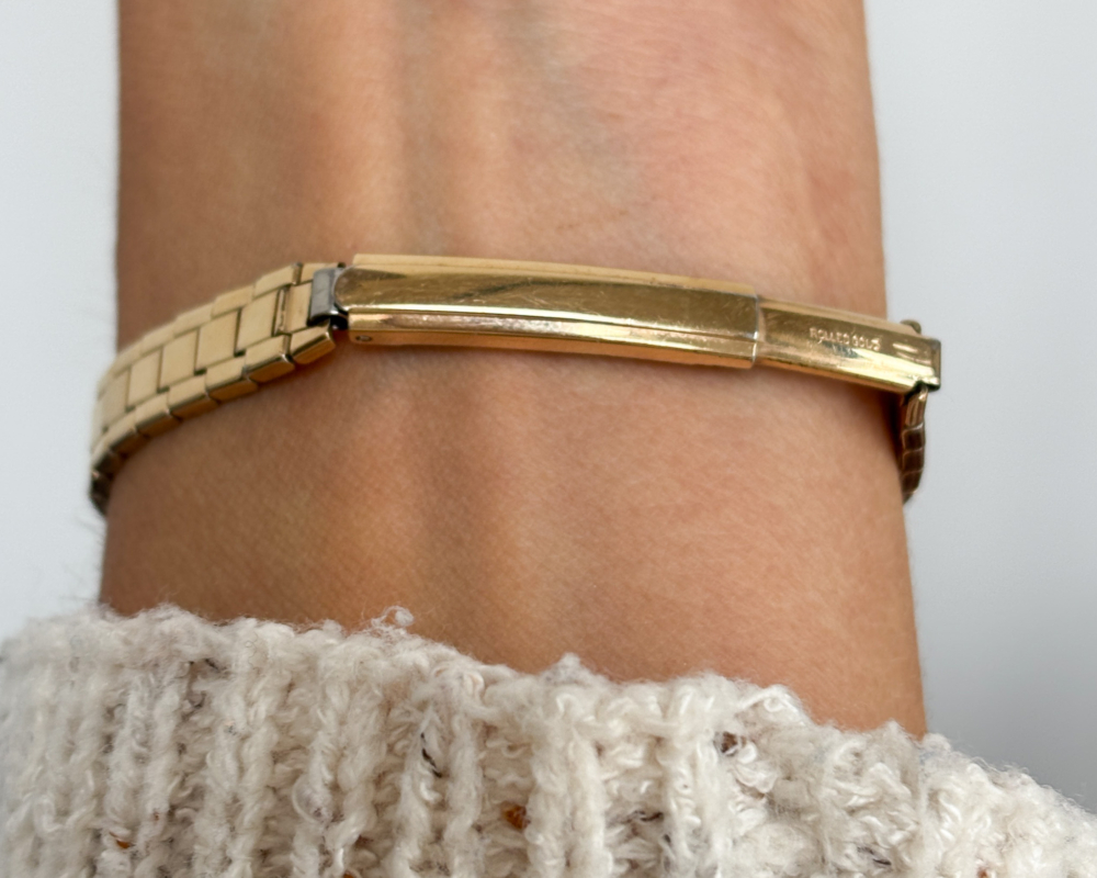 vintage omega ladies wristwatch with 9ct gold bezel and rolled gold strap. For sale in Leeds, shown on wrist