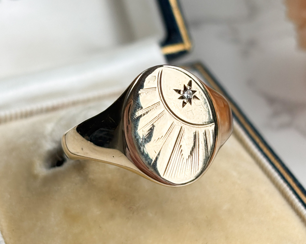 vintage 9ct gold and diamond signet ring circa 1960s with starburst design.