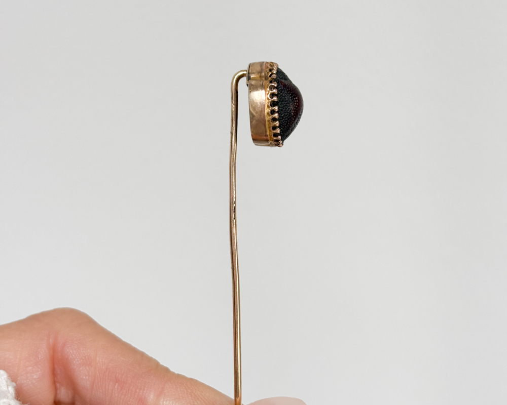 antique scarab beetle stick pin in 9ct gold, showing side of the pin