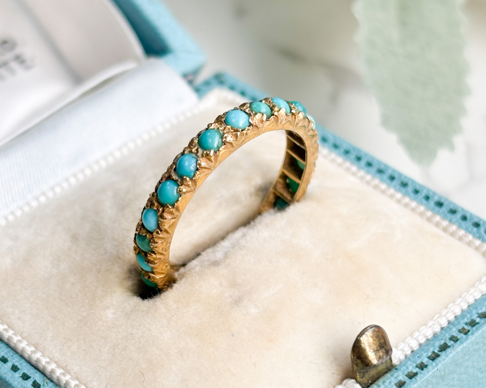 antique Victorian turquoise eternity ring for sale in Leeds, UK, shown in a box