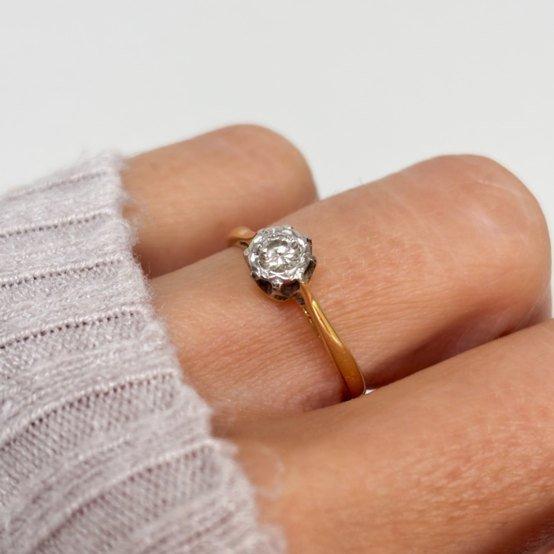 1930s illusion set diamond solitaire ring for sale in Leeds, UK, shown on woman's finger