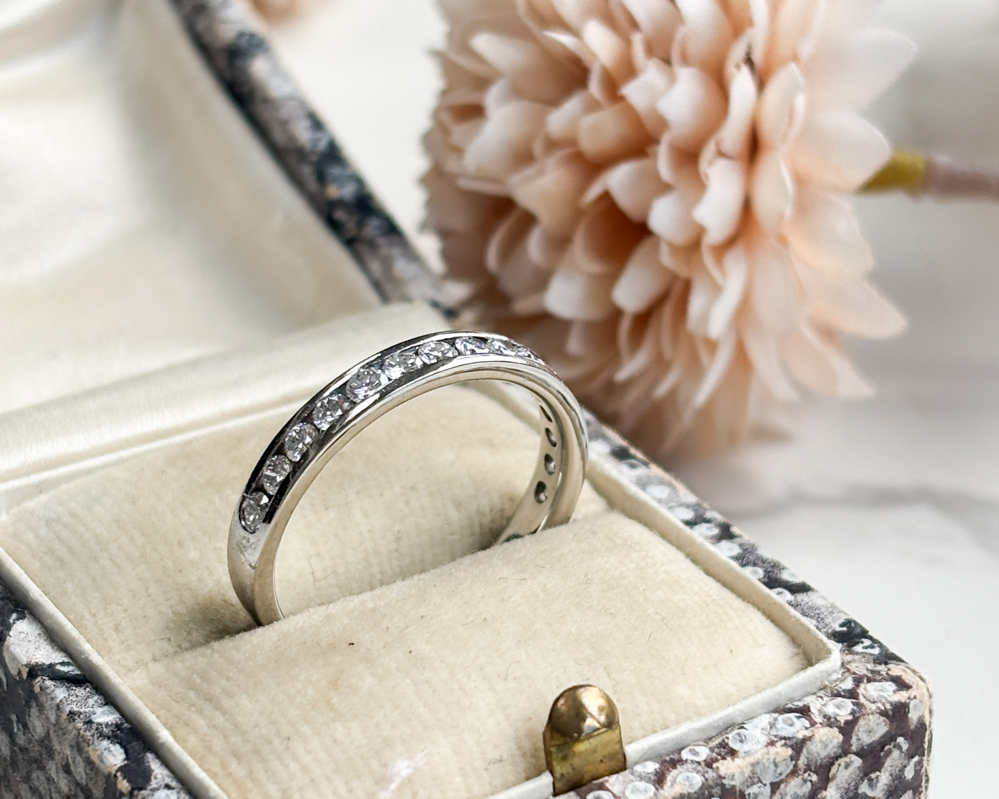 pre-owned platinum and diamond half eternity ring for sale in Leeds