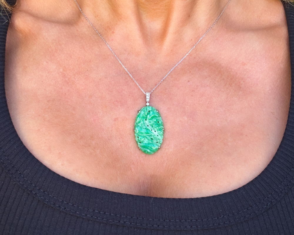 antique Art Deco jade and diamond necklace in platinum for sale in Leeds, shown on woman's neck