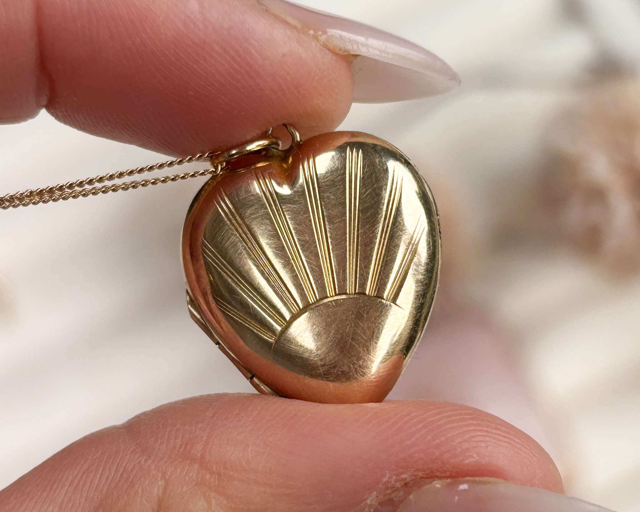 9ct gold back and front sunburst gold locket