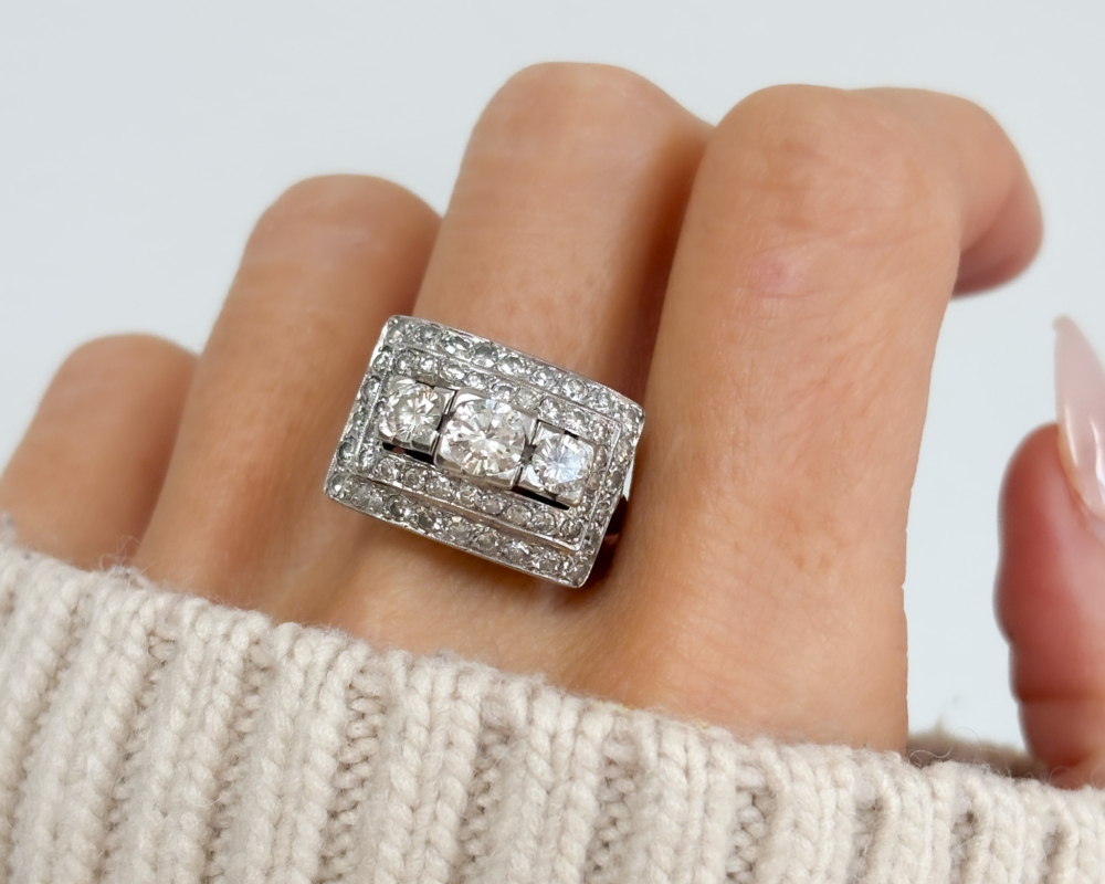 vintage 1940s statement ring with 2ct of diamonds in 18ct white gold for sale in Leeds, UK, shown on a woman's finger