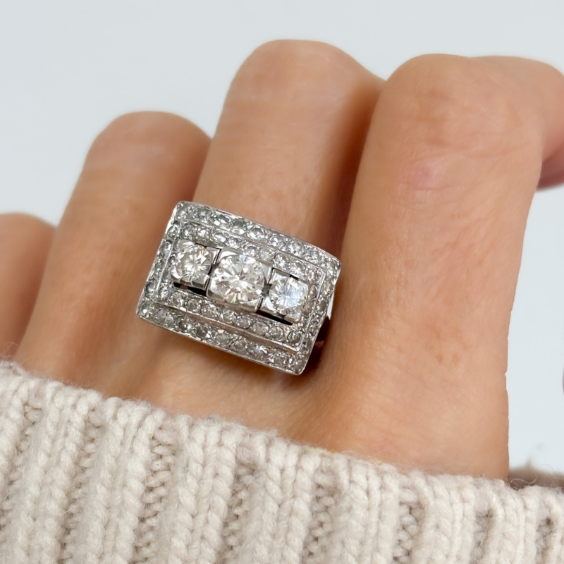 vintage 1940s statement ring with 2ct of diamonds in 18ct white gold for sale in Leeds, UK, shown on a woman's finger
