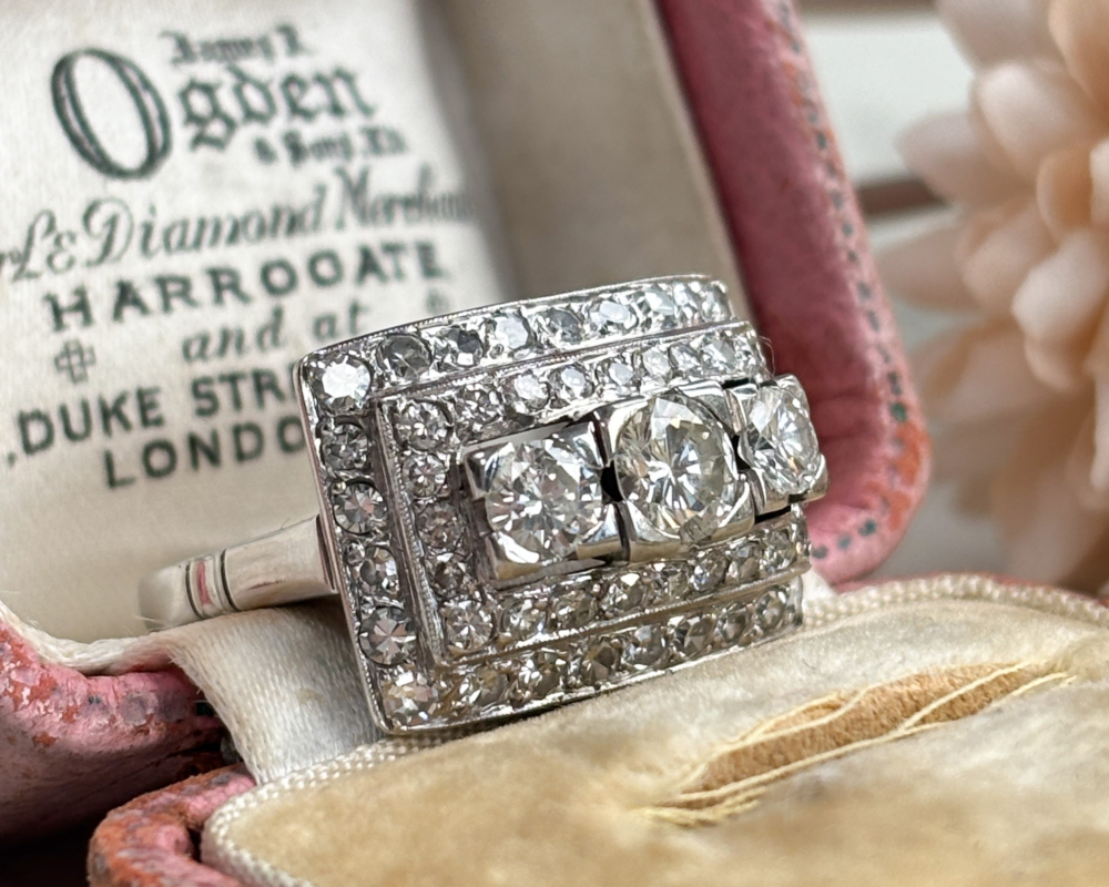 vintage 1940s statement ring with 2ct of diamonds in 18ct white gold for sale in Leeds, UK, showing side view