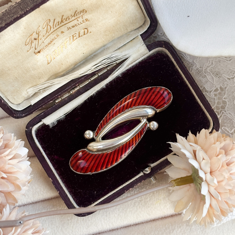 vintage Modernist silver brooch with red enamel