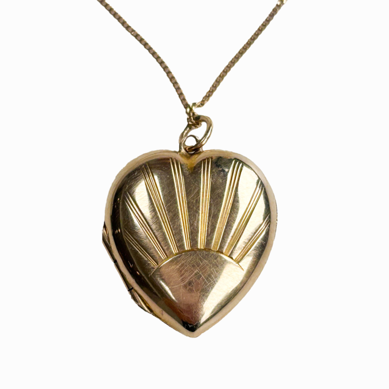 vintage gold sunburst heart locket and chain for sale in Leeds