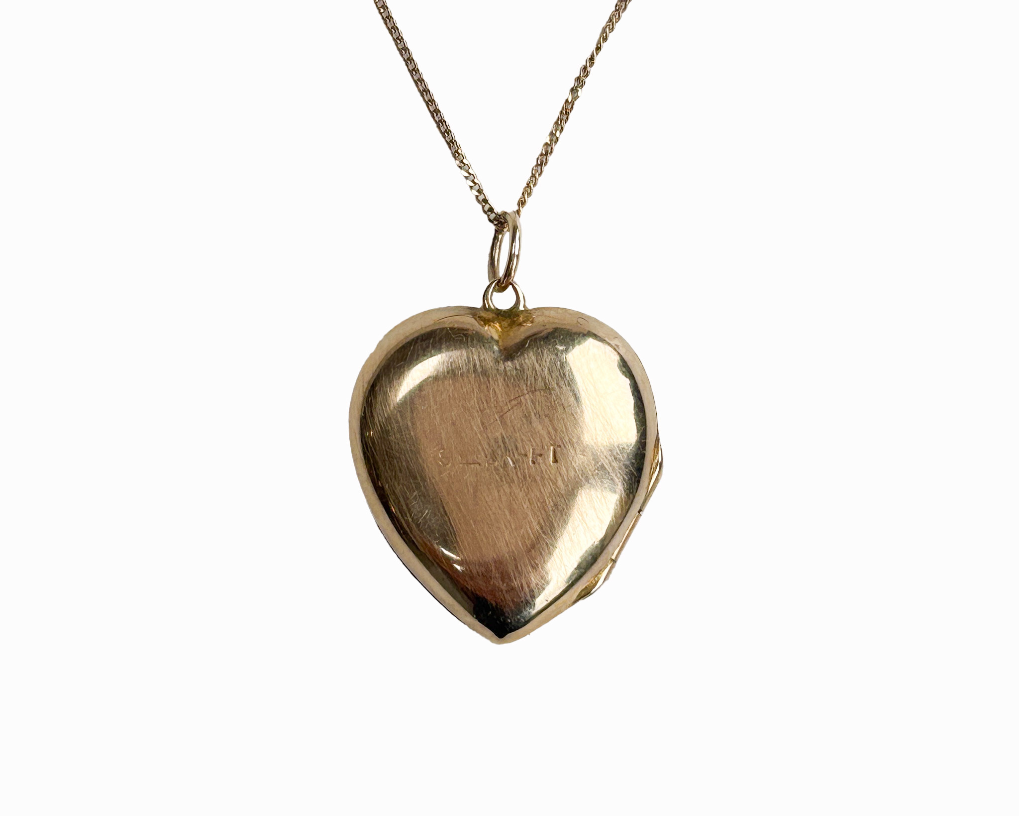 vintage gold sunburst heart locket back