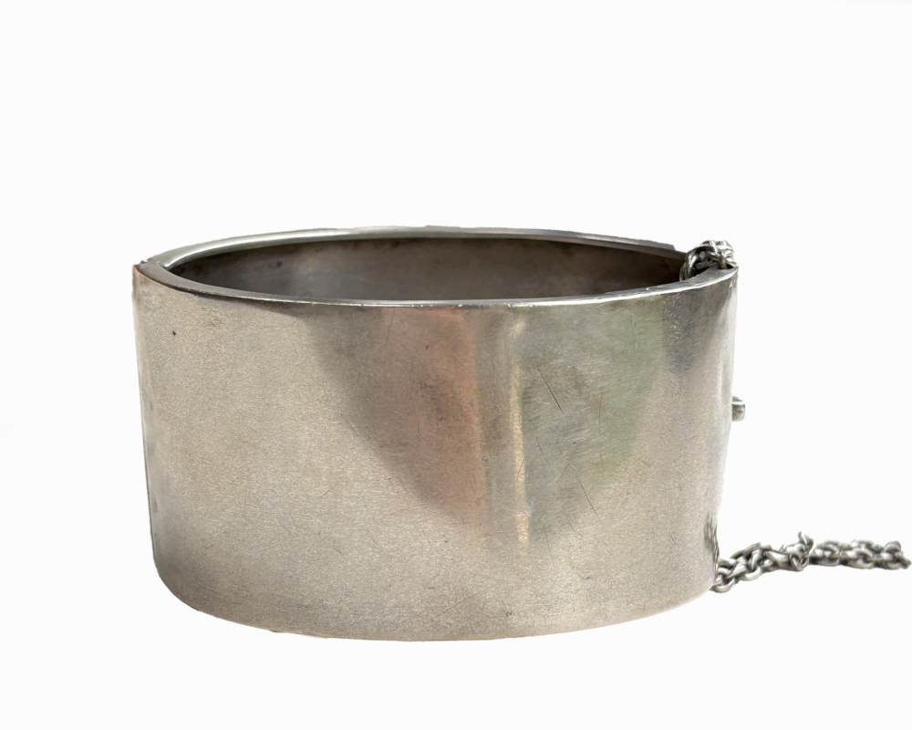 antique Victorian wide silver cuff bangle showing plain back of the bangle