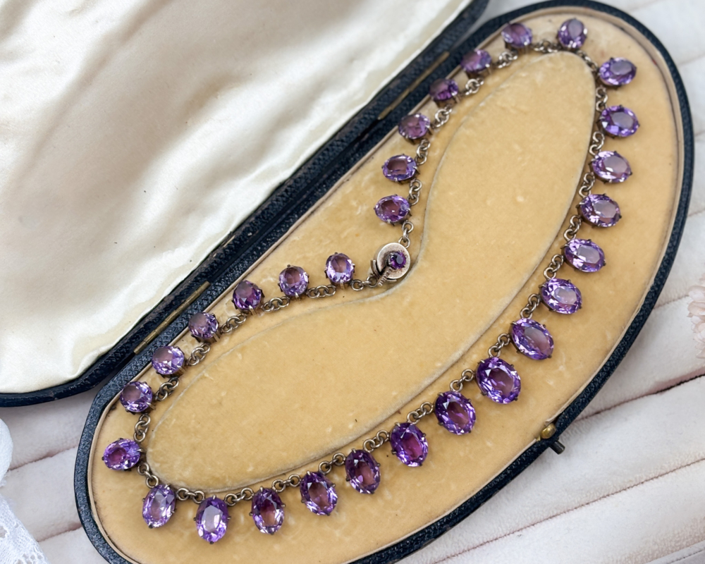 antique Edwardian silver and amethyst riviere necklace in silver. Shown in box. For sale in Leeds