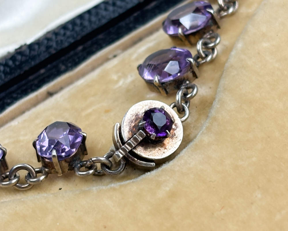 antique Edwardian silver and amethyst riviere necklace in silver. Showing clasp. For sale in Leeds