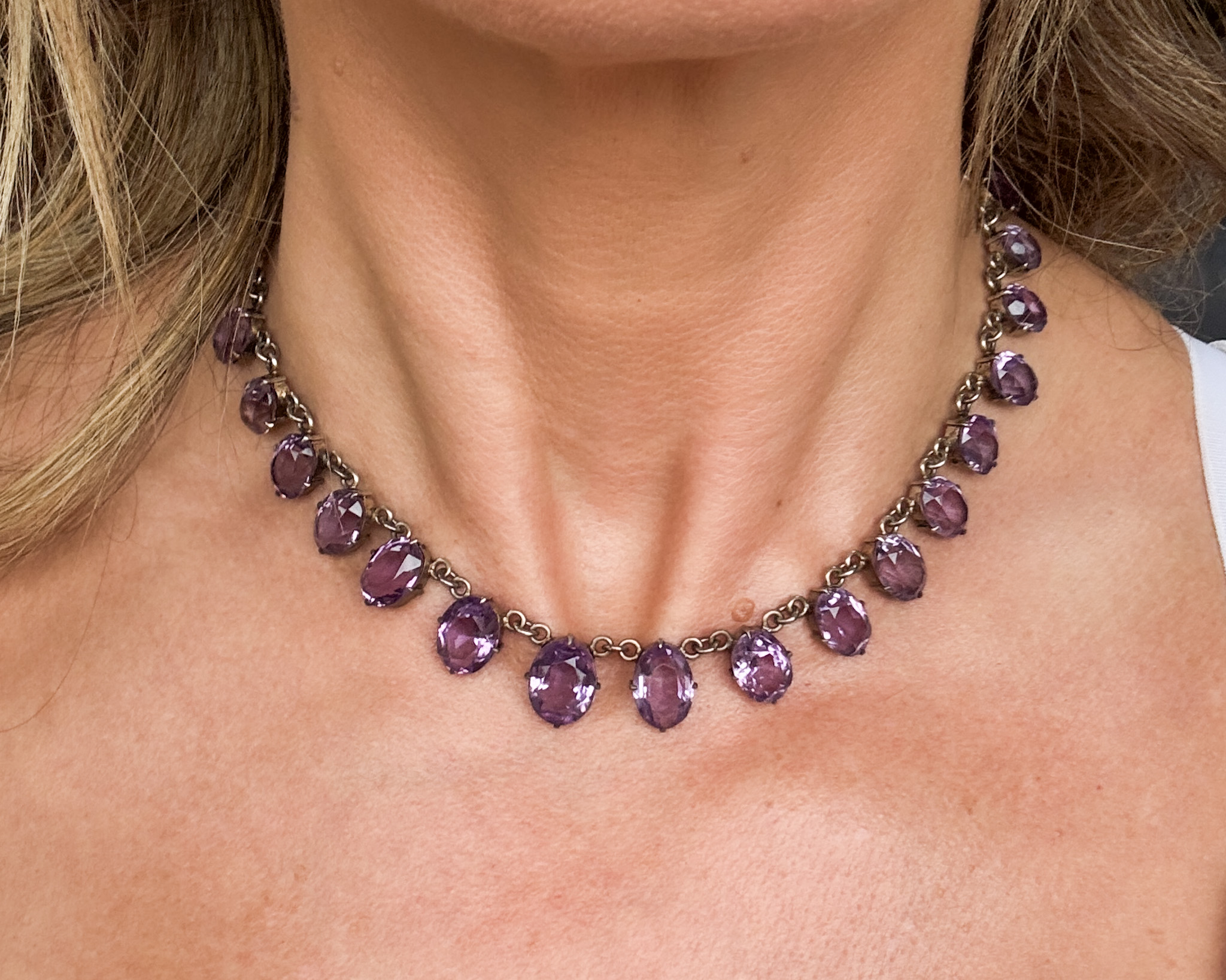 woman wearing antique amethyst necklace