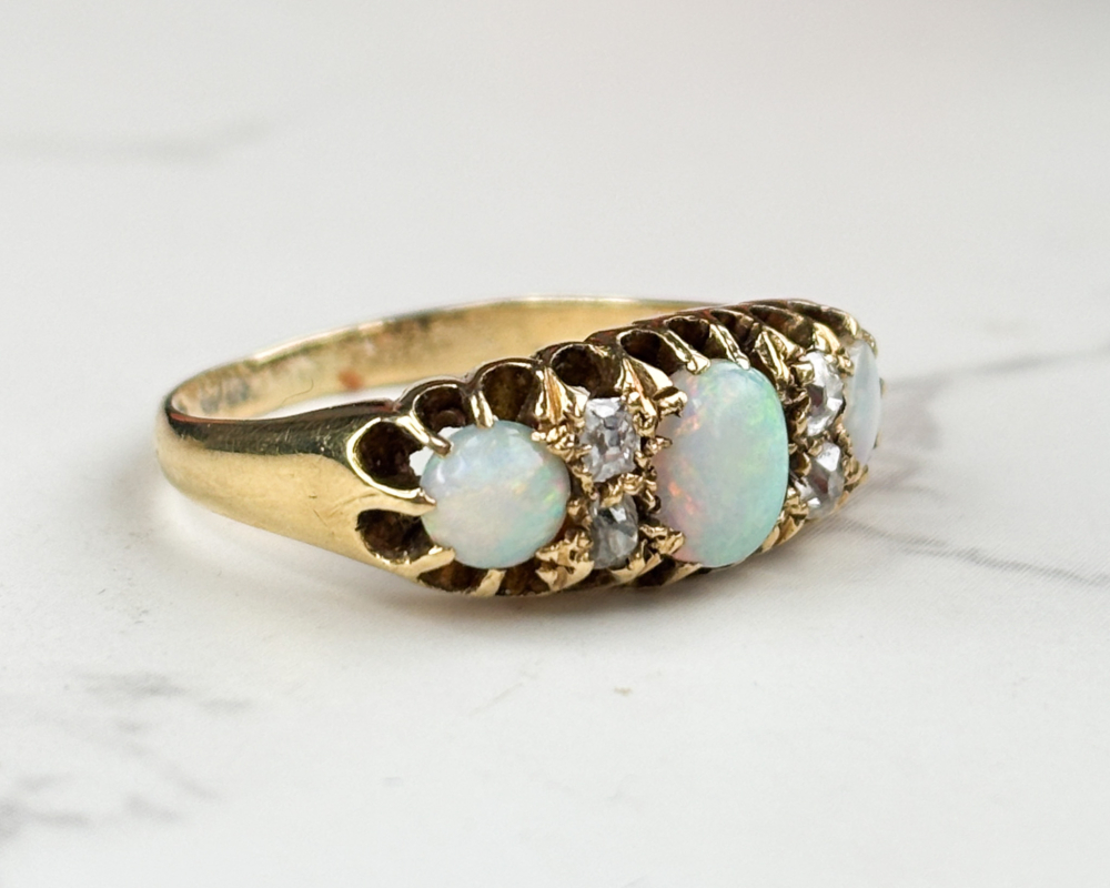 antique Victorian opal and diamond ring in 18ct yellow gold for sale in Leeds, showing side view