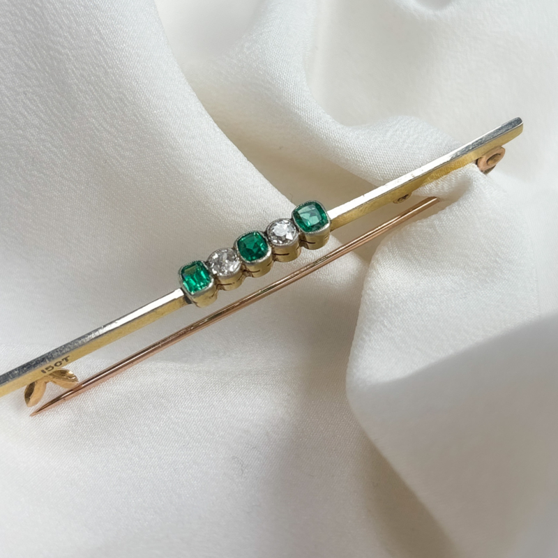 antique Edwardian emerald and diamond bar brooch in 15ct gold and platinum topped. for sale in Leeds
