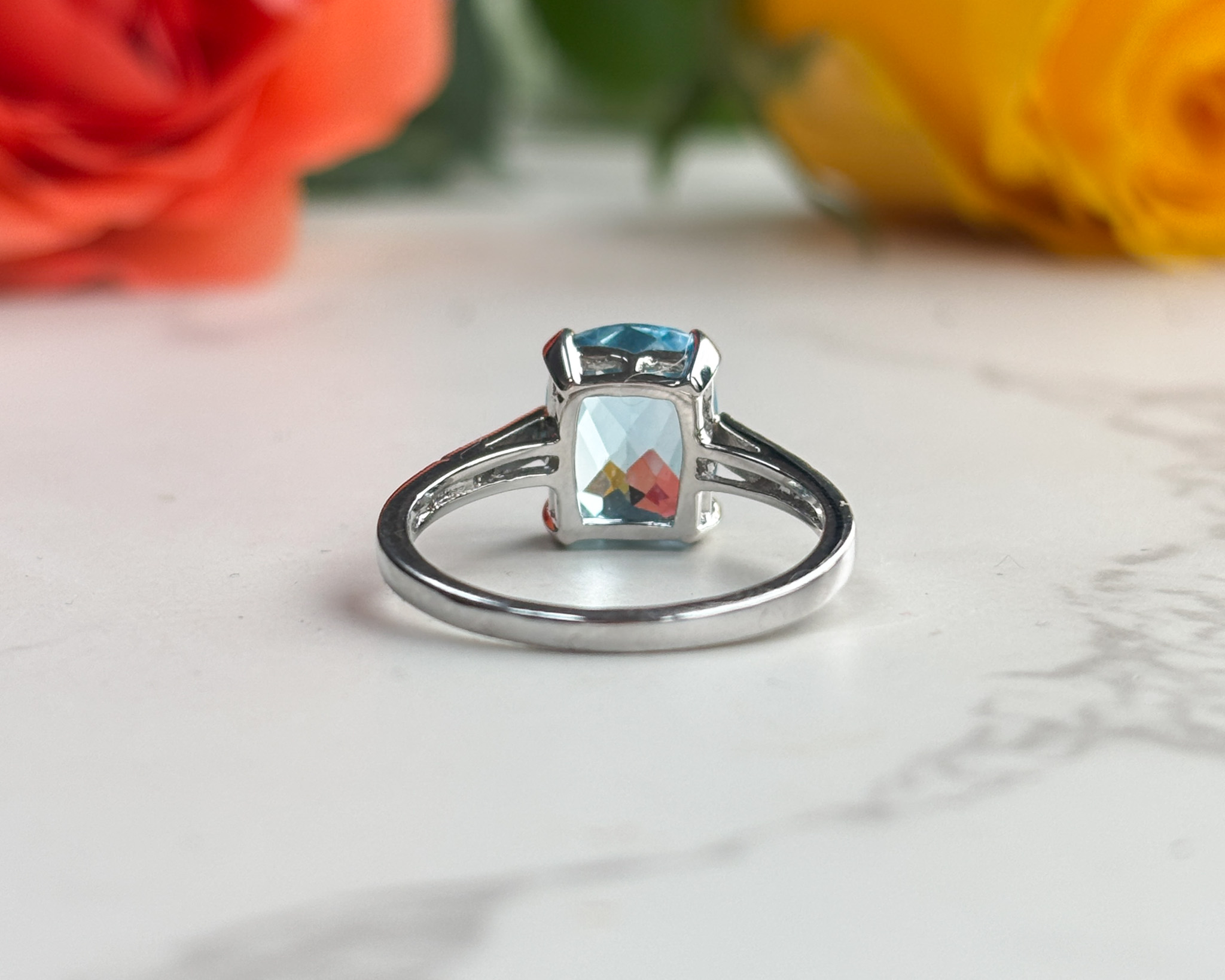 back of blue topaz ring