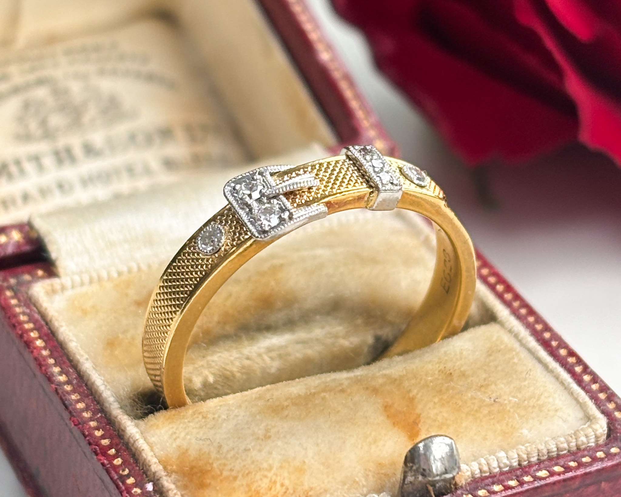 antique diamond buckle ring in box