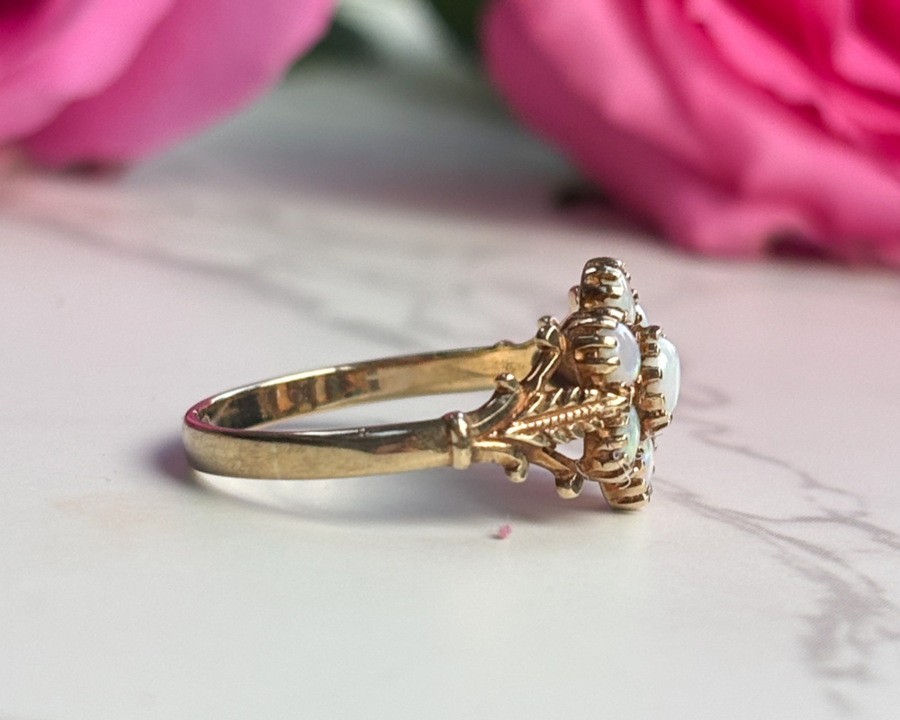 vintage opal cluster ring in 9ct gold for sale in Leeds, side view of the ring