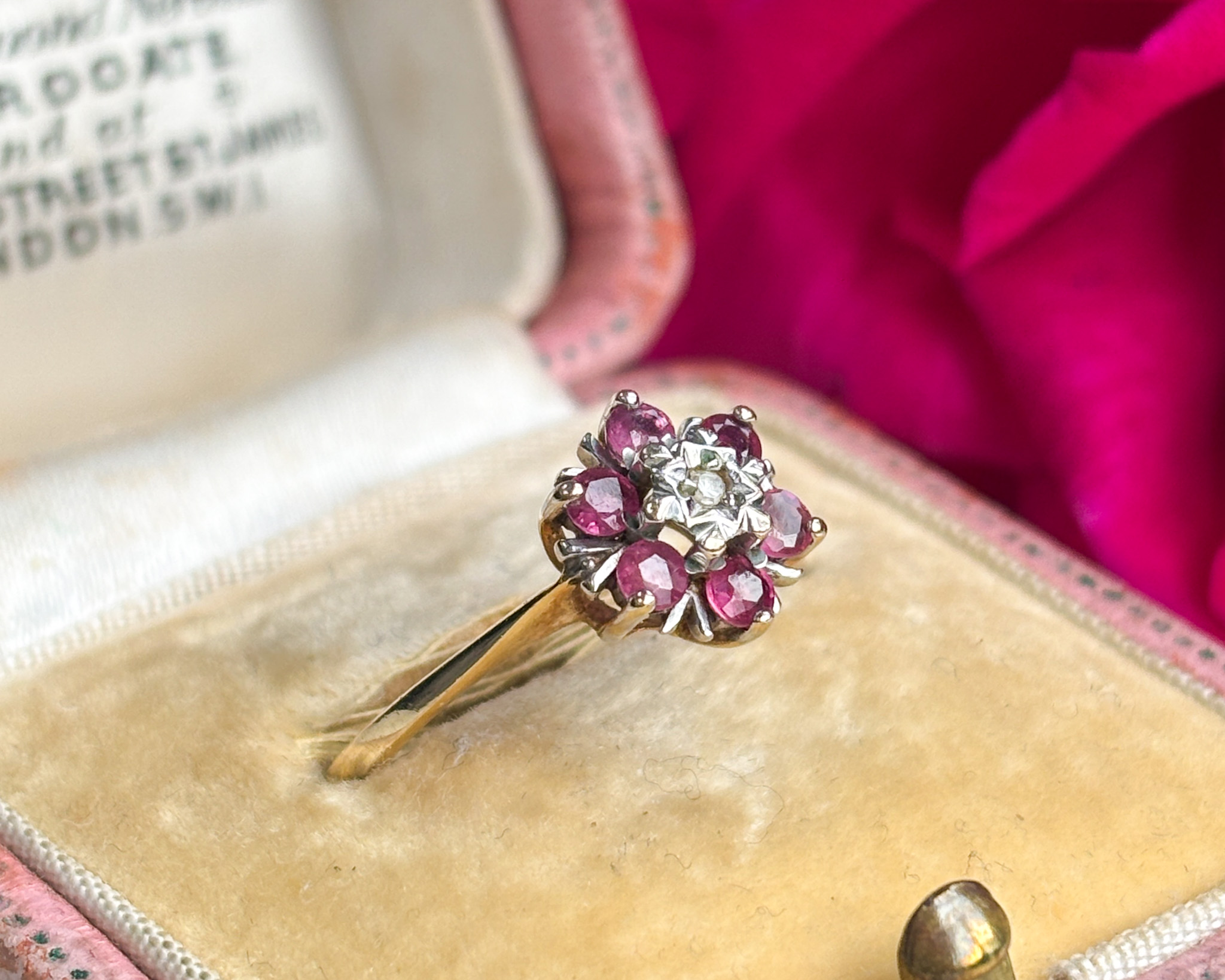 pink spinel ring in box