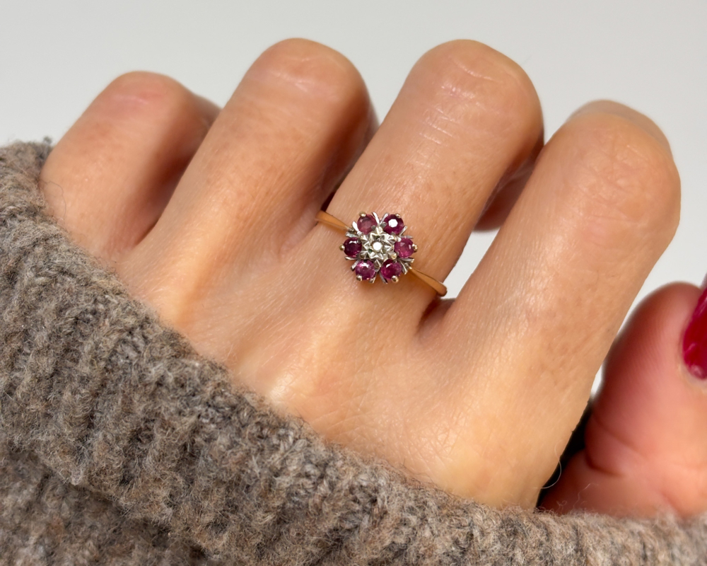 vintage pink spinel cluster ring in 9ct gold for sale in Leeds, shown on a woman's hand