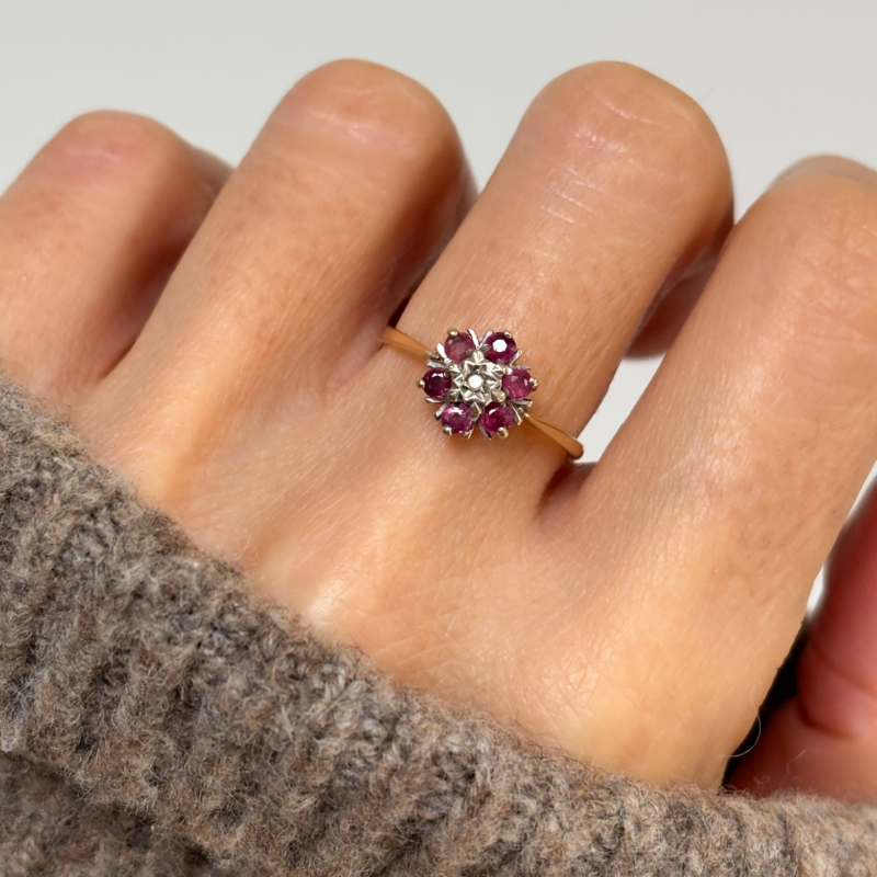 vintage pink spinel cluster ring in 9ct gold for sale in Leeds, shown on a woman's hand