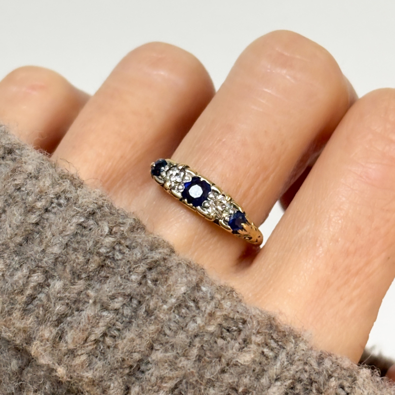 Victorian sapphire and diamond five stone ring for sale in Leeds, Yorkshire, shown on woman's hand