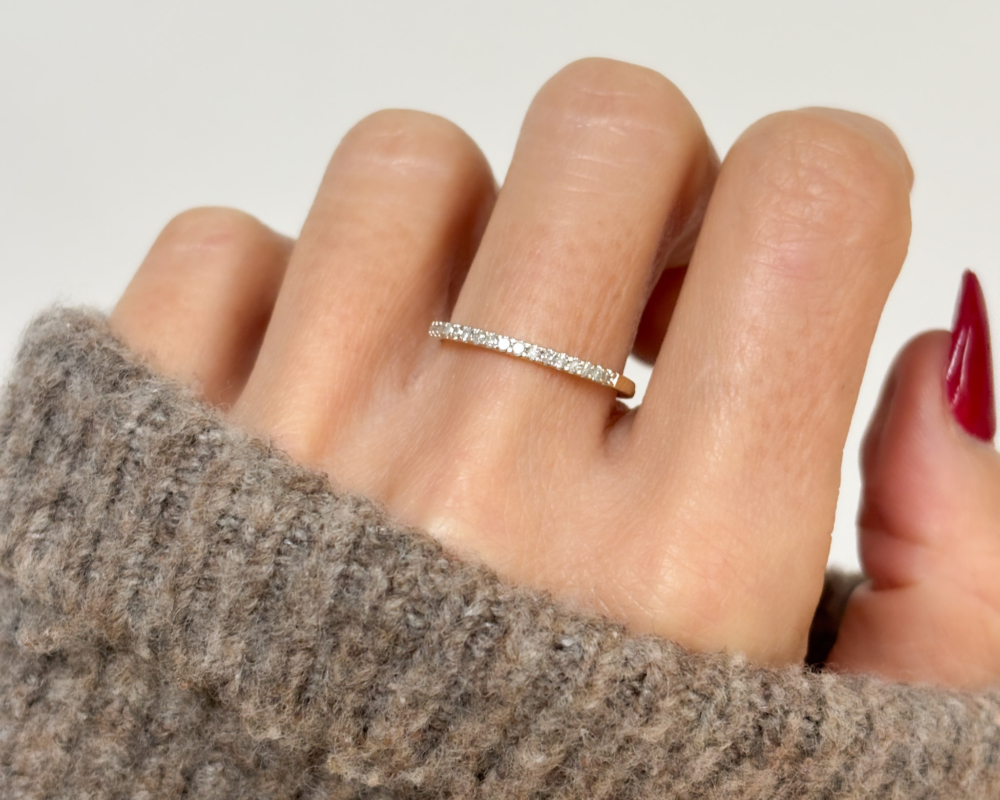 vintage diamond stacking ring in 9ct yellow gold for sale in Leeds. UK, shown on woman's hand