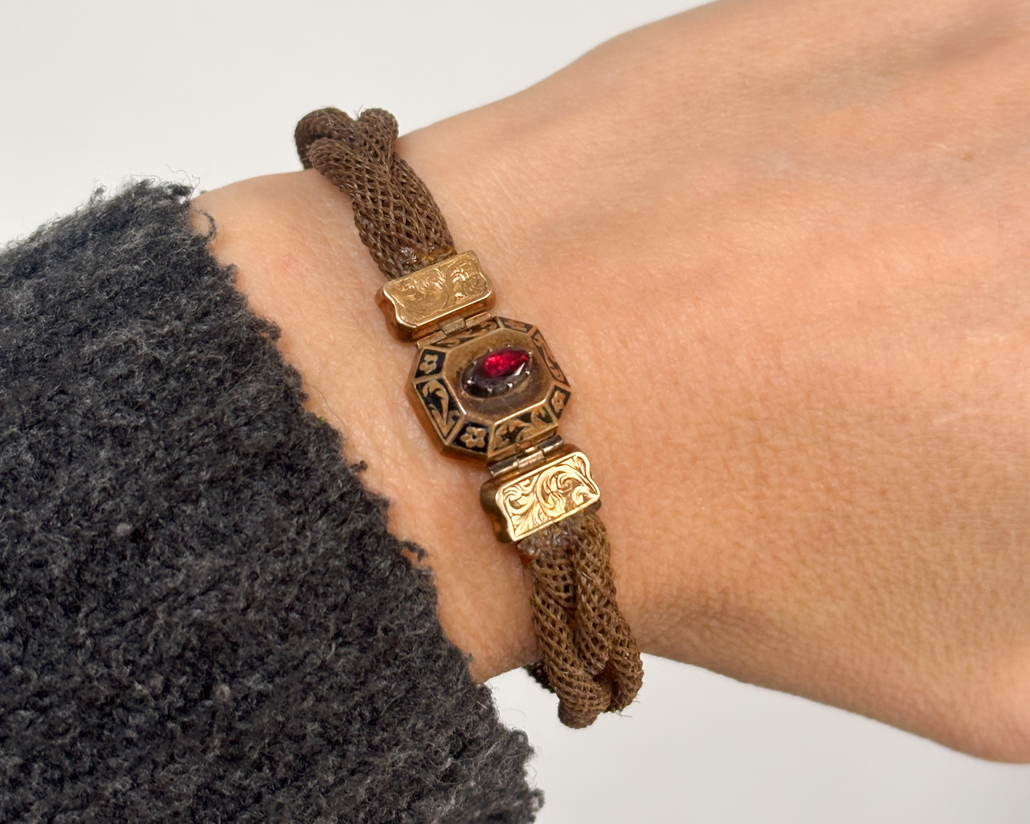 woman wearing mourning bracelet