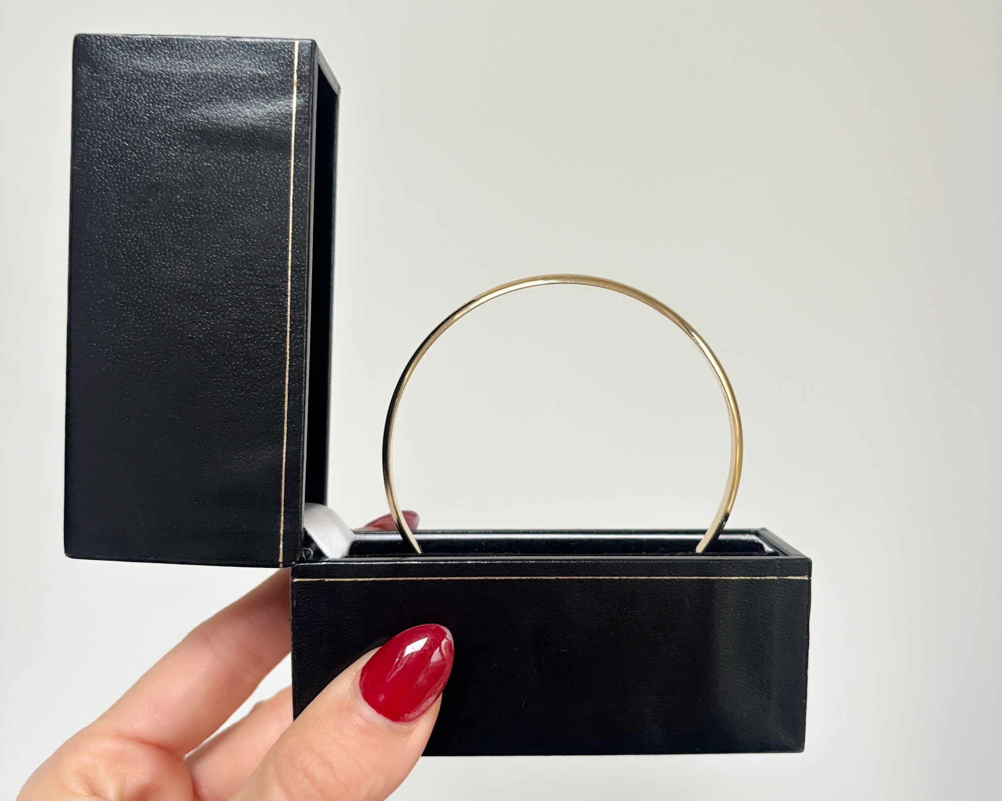 gold bangle in box