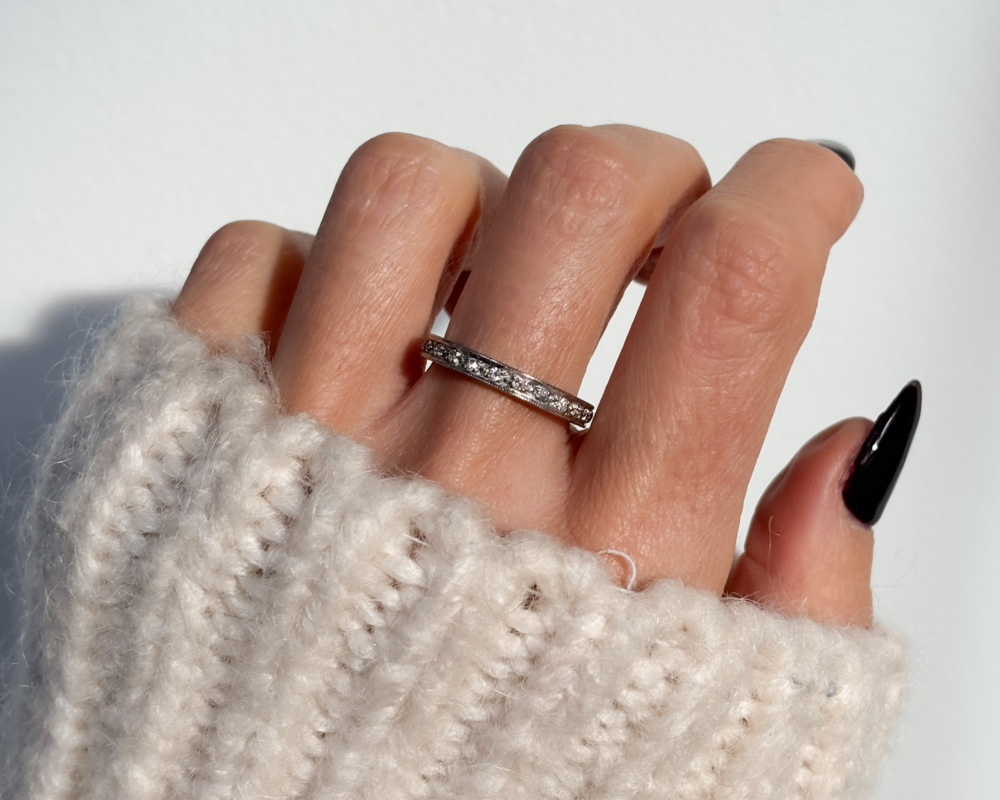 antique Art Deco diamond full eternity ring in platinum for sale, shown on lady's hand