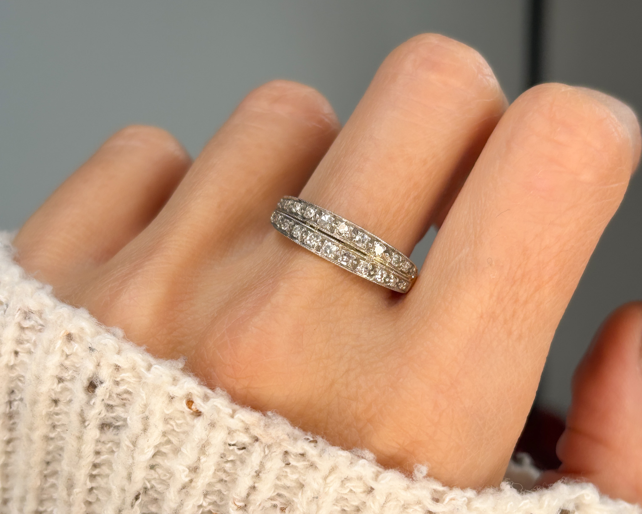 woman wearing double diamond eternity ring