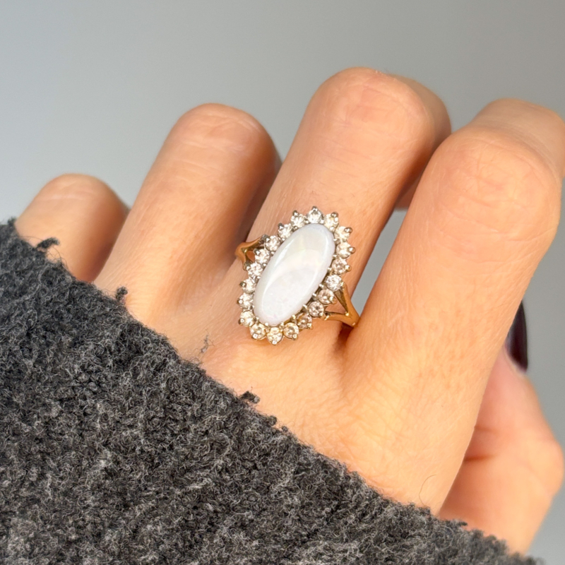 vintage opal and cz cluster ring in 9ct yellow gold for sale, shown on woman's hand