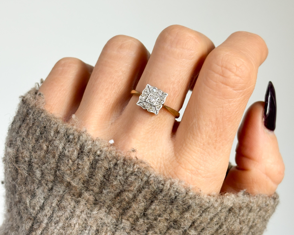 art deco diamond panel ring in 18ct yellow gold and set in platinum, shown on woman's hand