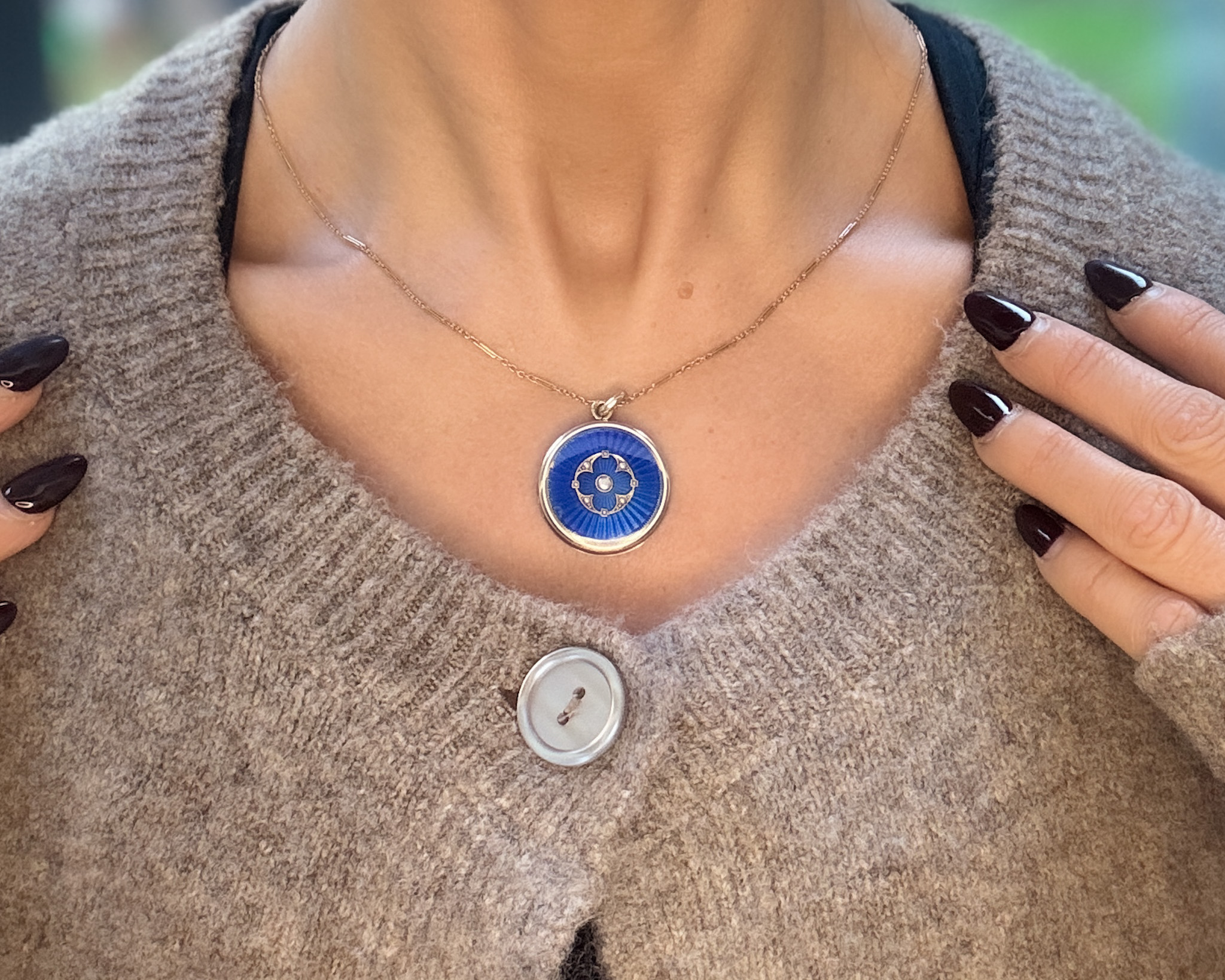 woman wearing antique locket