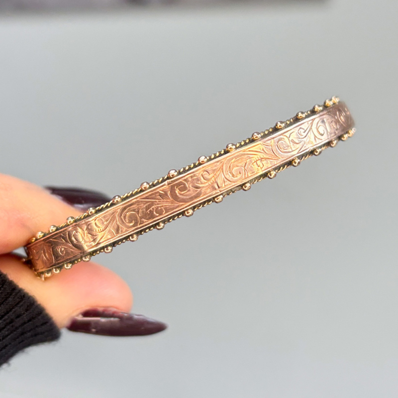 antique Victorian rose gold bangle with engraving and safety chain for sale in Leeds