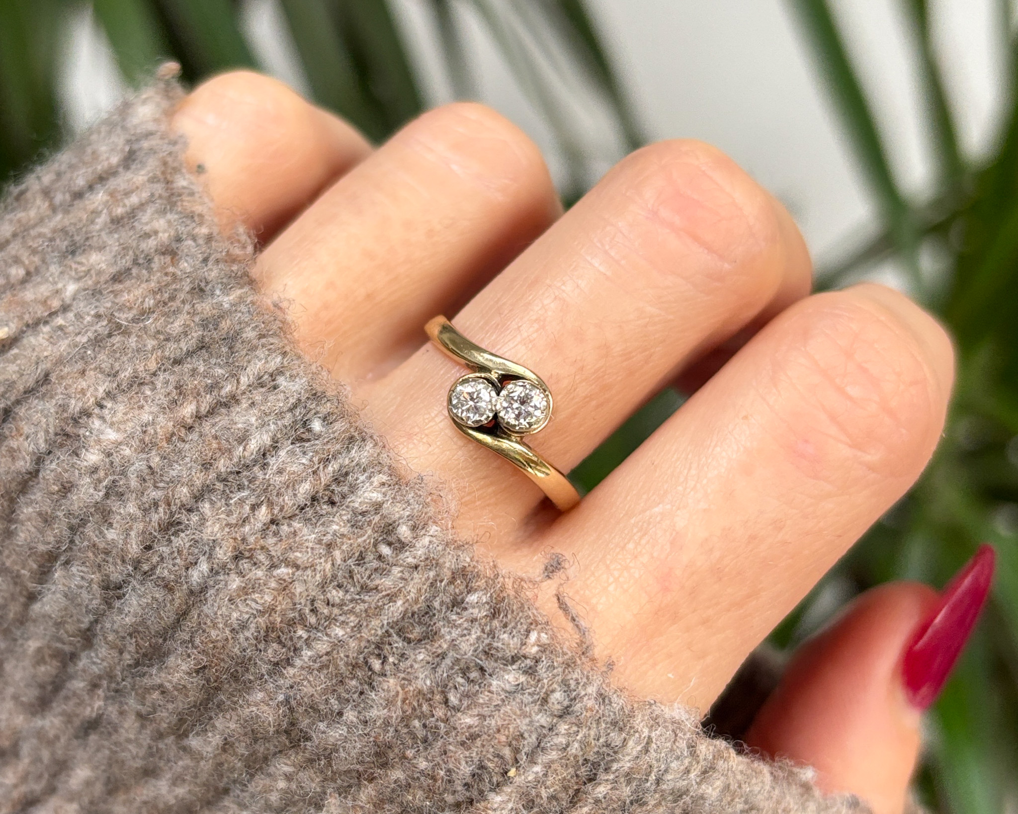 woman wearing toi et moi ring