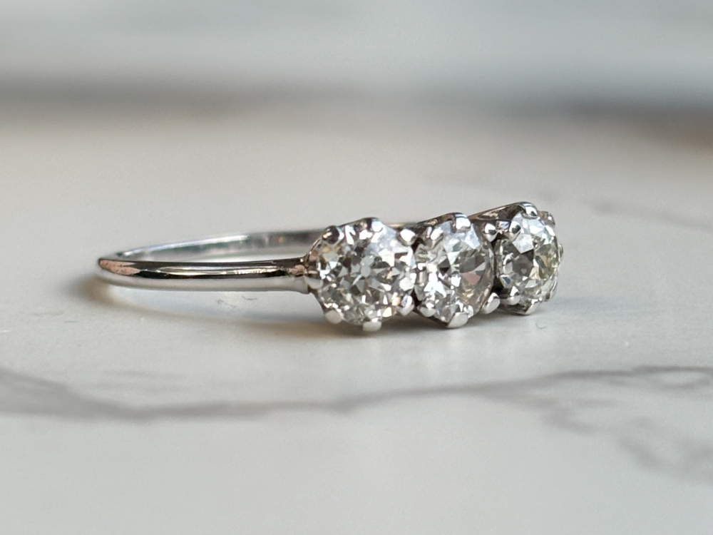 antique Edwardian three stone diamond ring in 18ct white gold and platinum. for sale in Leeds, UK, side of the ring
