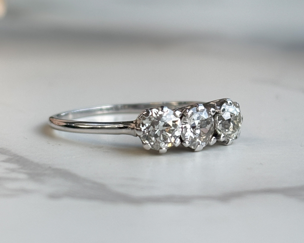 antique Edwardian three stone diamond ring in 18ct white gold and platinum. for sale in Leeds, UK, side of the ring