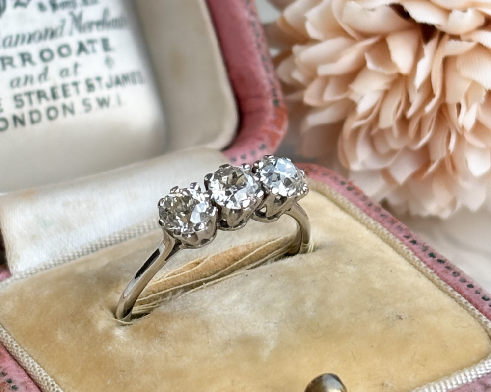 antique Edwardian three stone diamond ring in 18ct white gold and platinum. for sale in Leeds