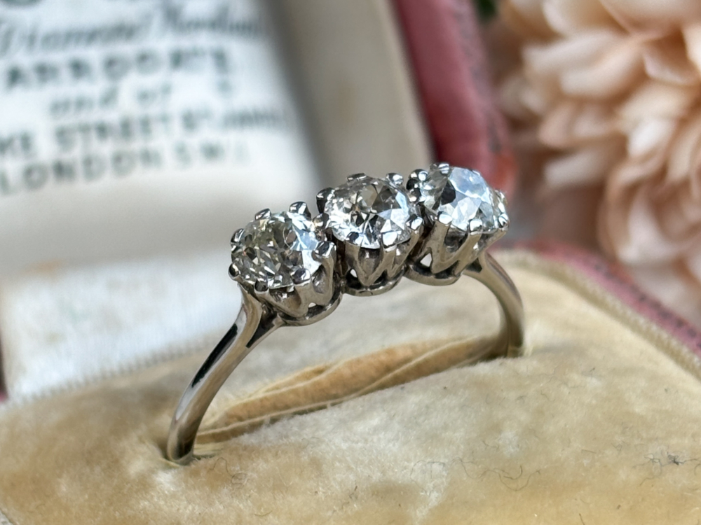 antique Edwardian three stone diamond ring in 18ct white gold and platinum. for sale in Leeds, UK, in a pin box