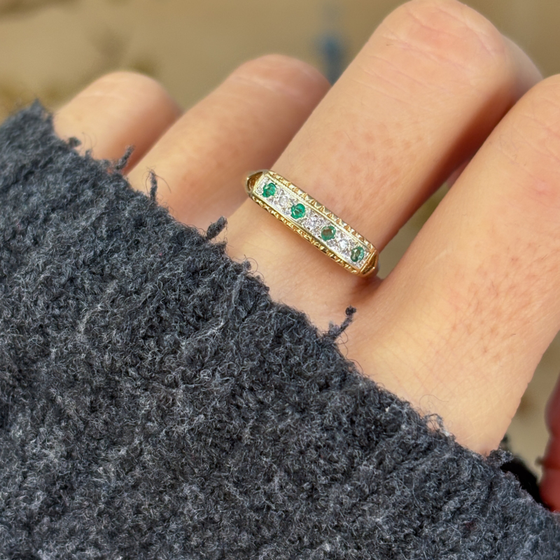 vintage emerald and diamond stacking ring in 9ct yellow gold for sale on woman's finger